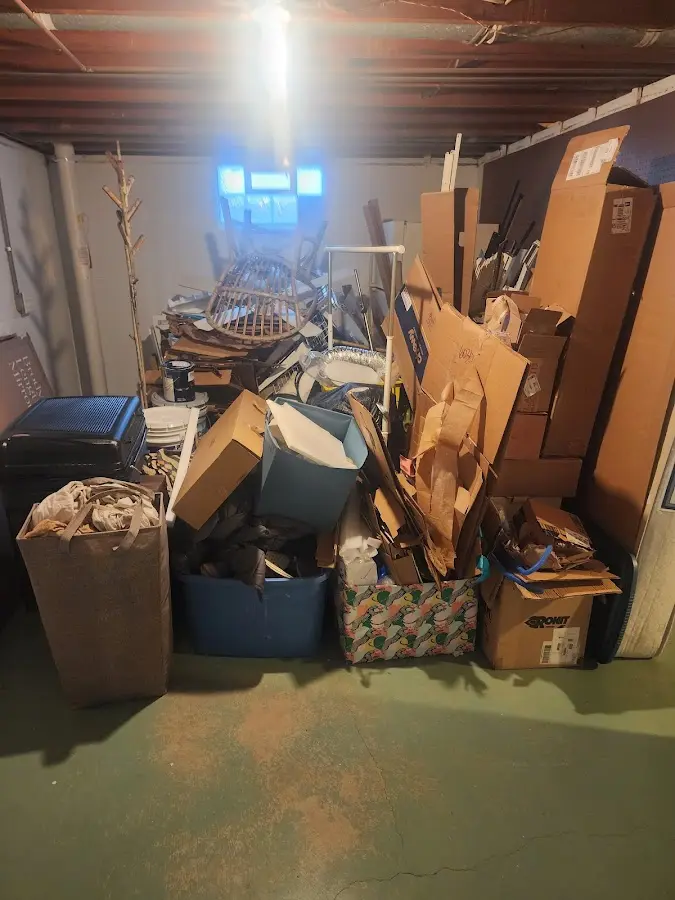 Roll-off dumpster container at job site for 6 Yard Dumpster Rental in Manchester